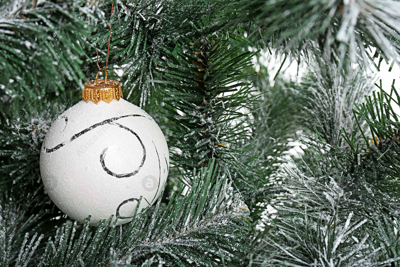 Photo of Beautiful ball on Christmas tree, closeup. Celebration time