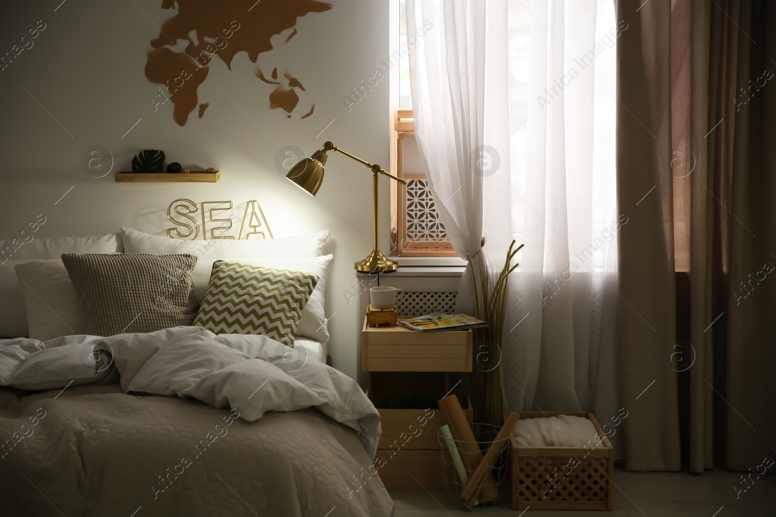 Photo of Modern eco style interior with wooden crates and comfortable bed