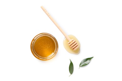 Photo of Tasty honey in glass jar, leaves and dipper on white background, flat lay