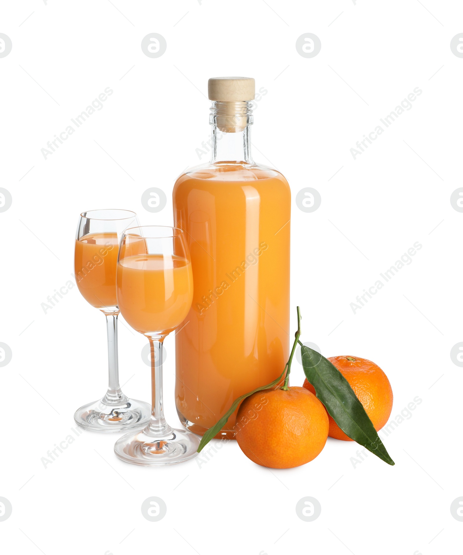 Photo of Tasty tangerine liqueur and fresh fruits isolated on white