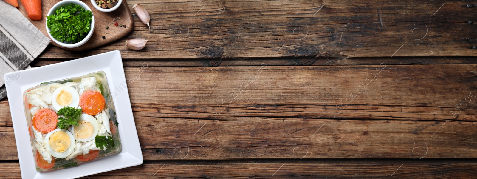 Image of Delicious fish aspic served on wooden table, flat lay with space for text. Banner design