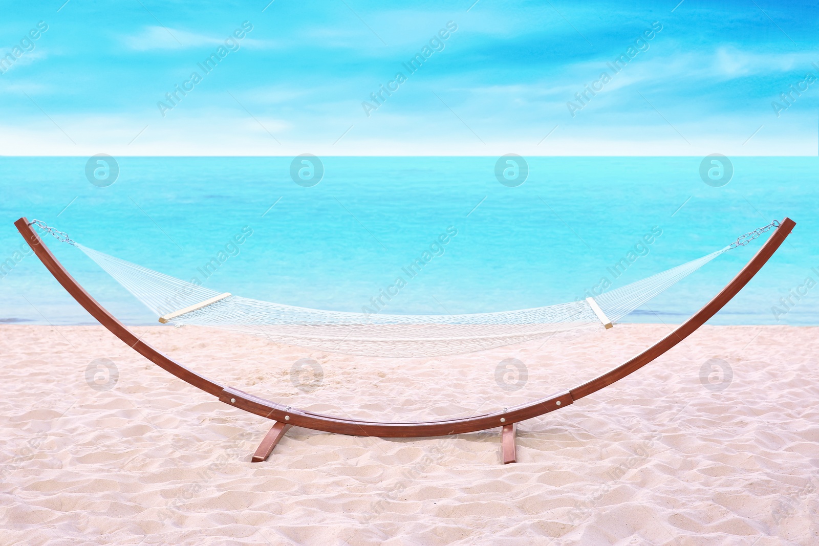 Photo of Empty hammock at seaside. Time to relax