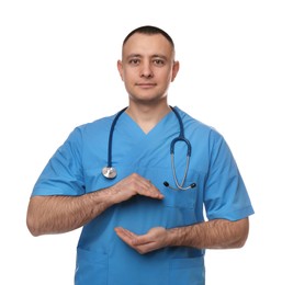 Photo of Doctor with stethoscope holding something on white background. Cardiology concept