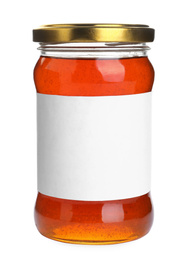 Glass jar of wildflower honey with blank label isolated on white