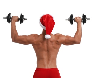 Photo of Sexy shirtless Santa Claus with dumbbells on white background