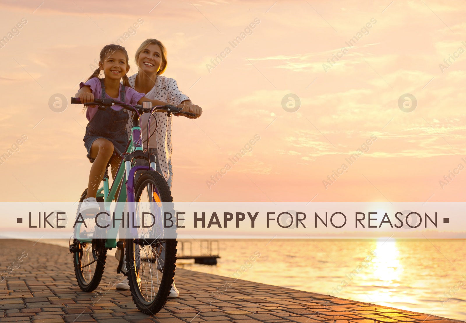 Image of Like A Child, Be Happy For No Reason. Inspirational quote saying that you don't need anything to feel happiness. Text against mother teaching daughter to ride bicycle outdoors