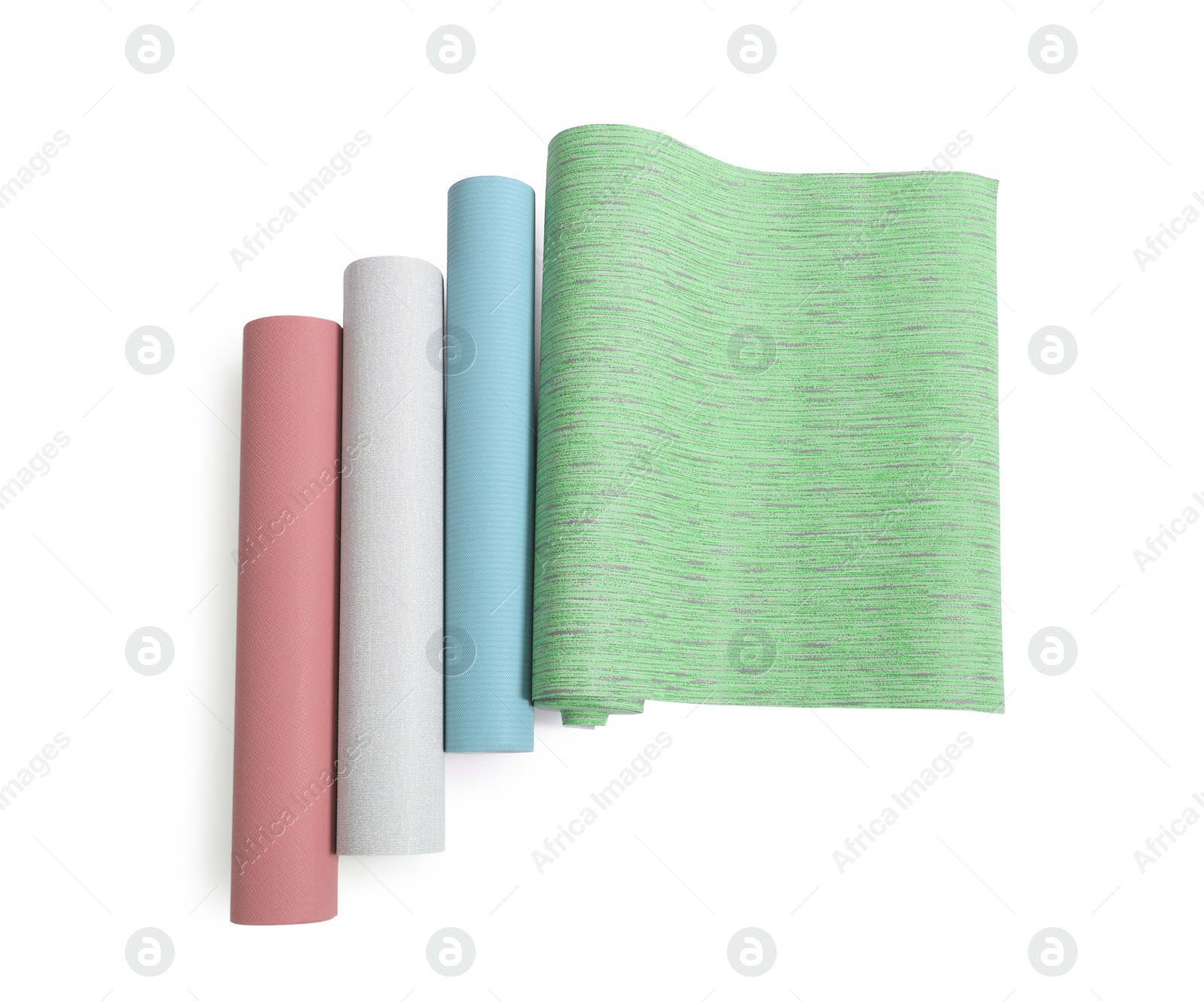 Image of Different colorful wallpaper rolls isolated on white, top view