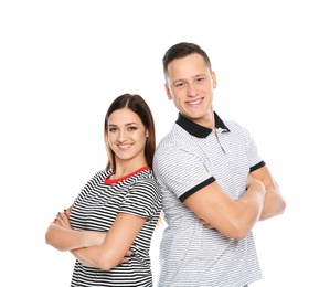 Portrait of cute young couple on white background