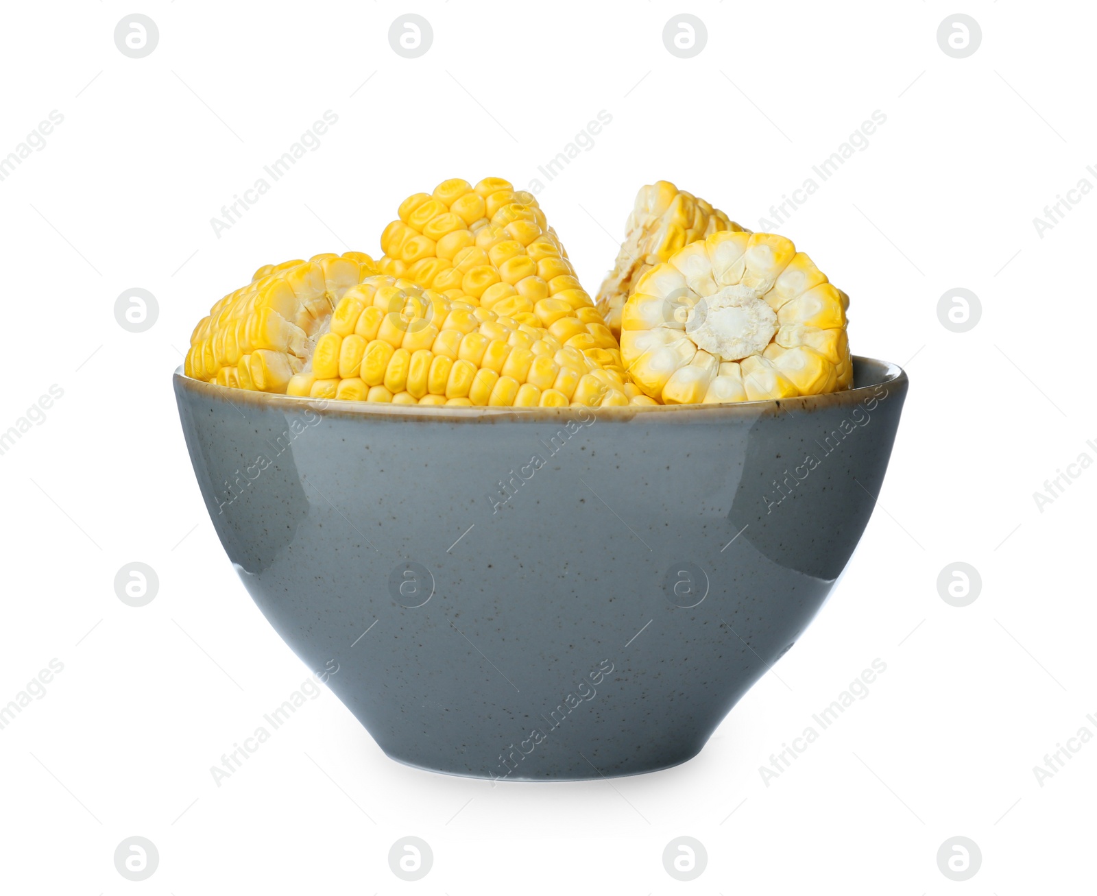 Photo of Bowl with pieces of fresh corncobs on white background