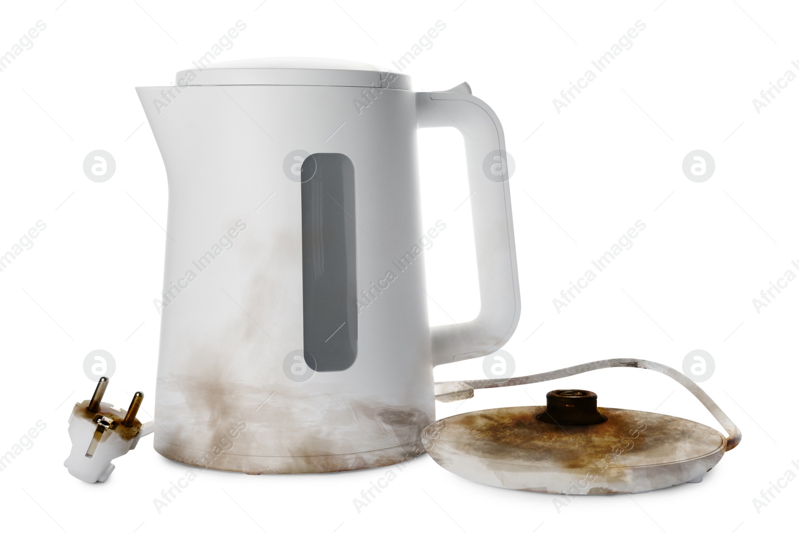 Image of Burnt electric kettle with base and plug on white background