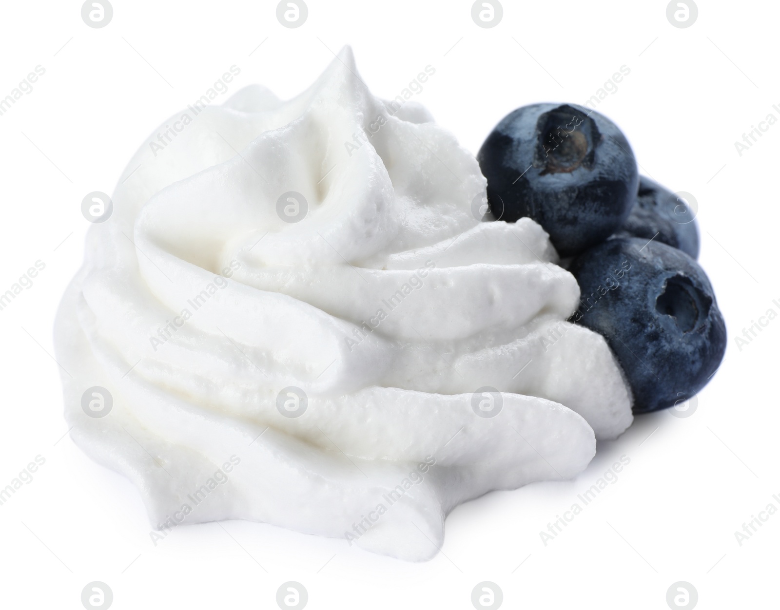 Photo of Delicious fresh whipped cream with blueberries isolated on white