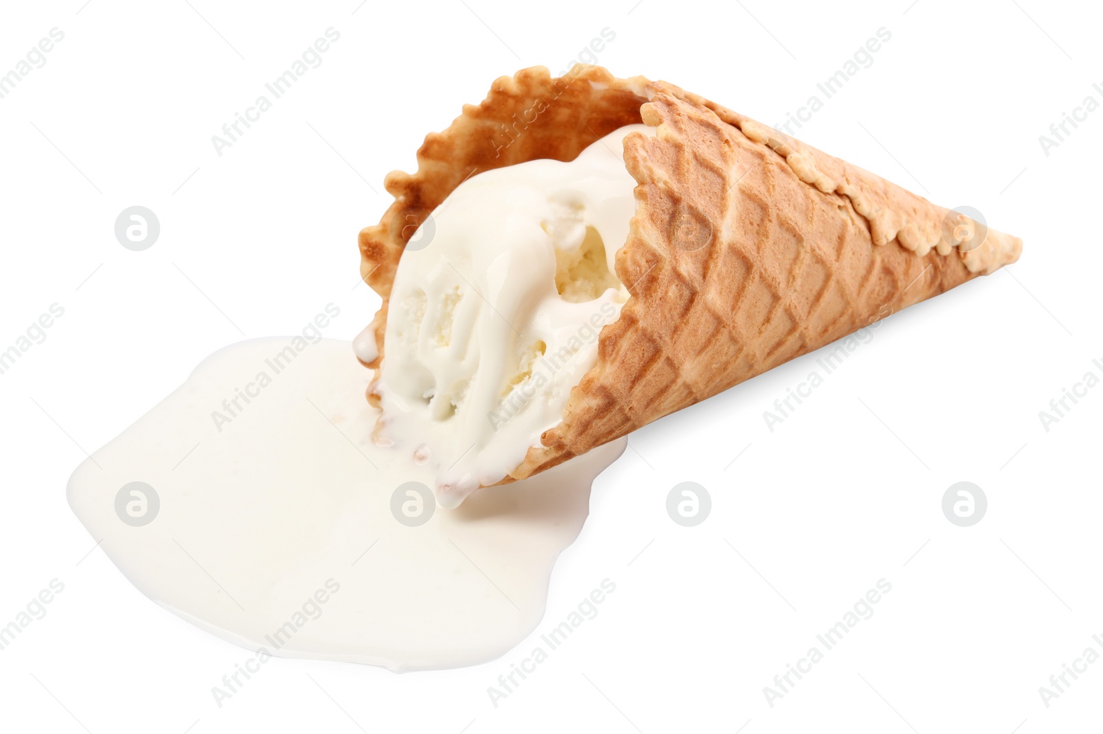 Photo of Melting ice cream in wafer cone isolated on white