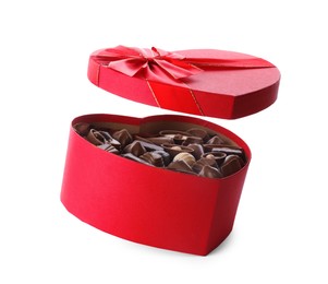 Heart shaped box with delicious chocolate candies on white background