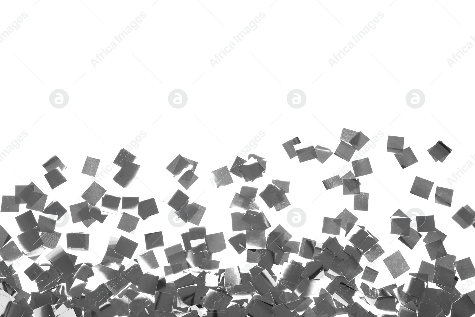 Photo of Bright confetti on white background, top view