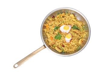 Photo of Tasty rice with meat, eggs and vegetables in frying pan isolated on white, top view