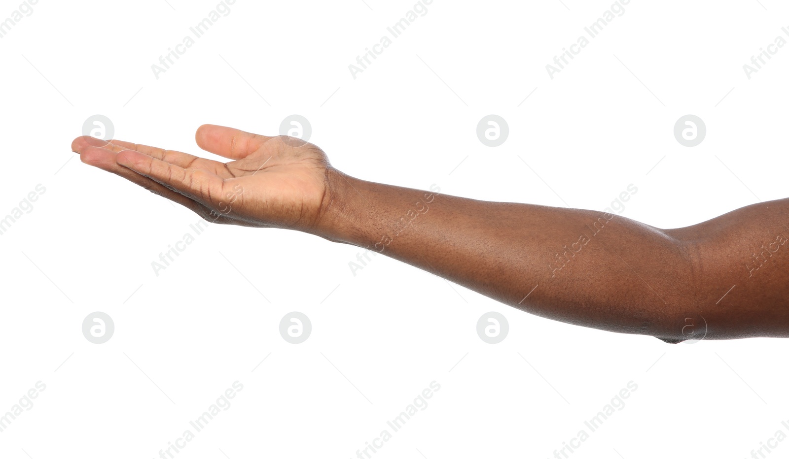 Photo of African-American man holding something in hand on white background, closeup