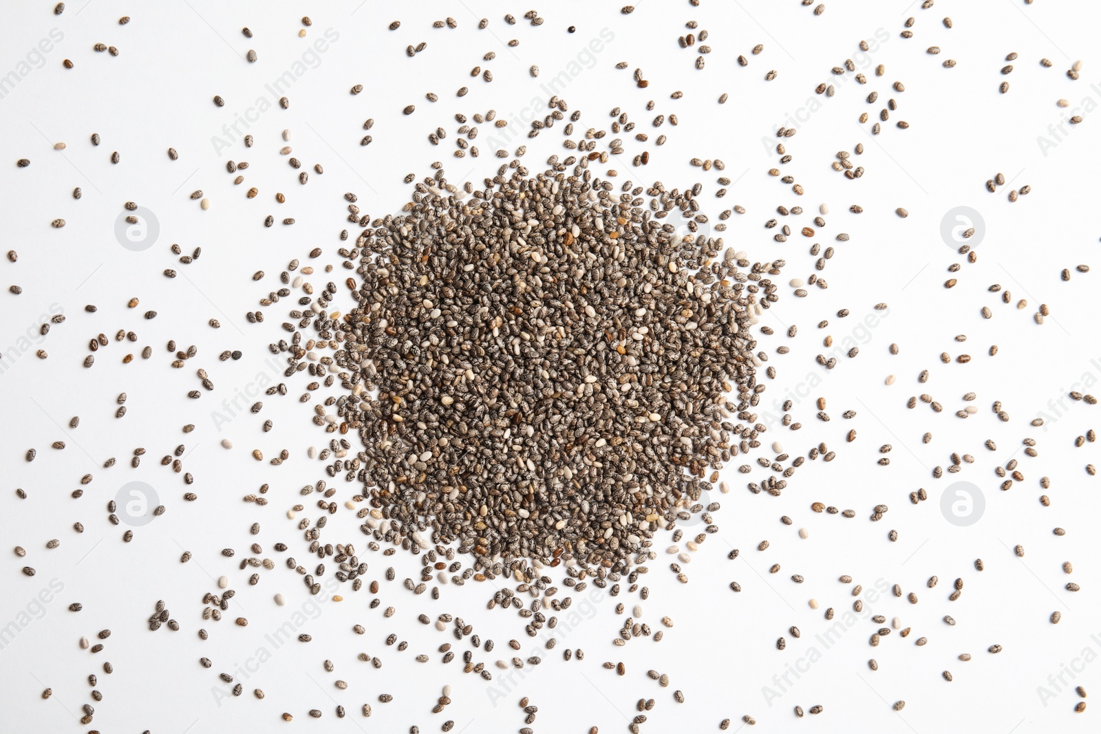 Photo of Chia seeds isolated on white, top view