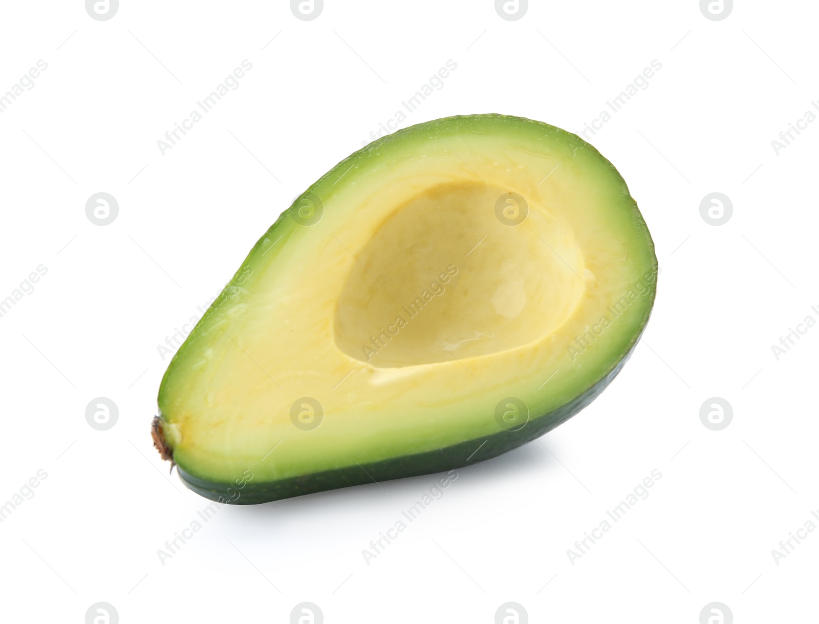 Photo of Half of ripe avocado on white background