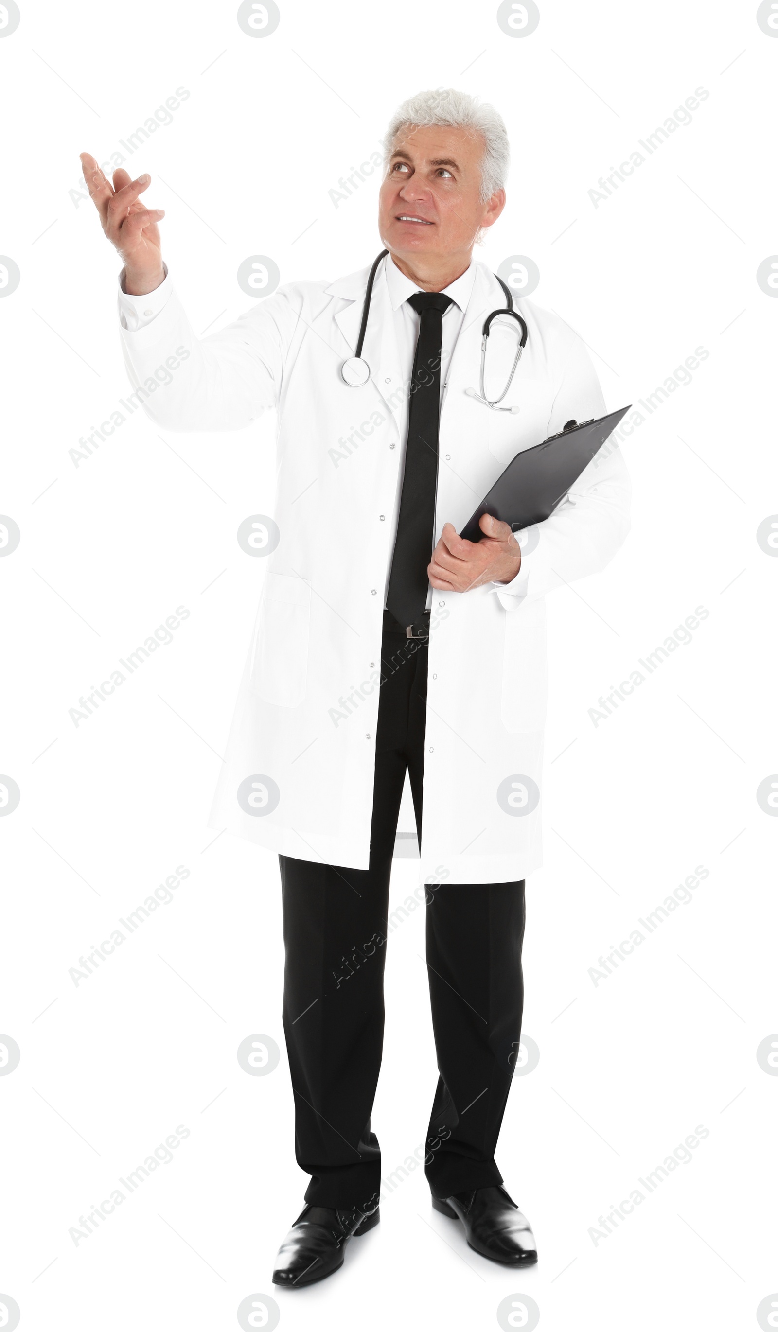 Photo of Full length portrait of male doctor with clipboard isolated on white. Medical staff