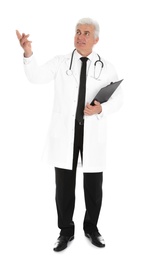 Full length portrait of male doctor with clipboard isolated on white. Medical staff