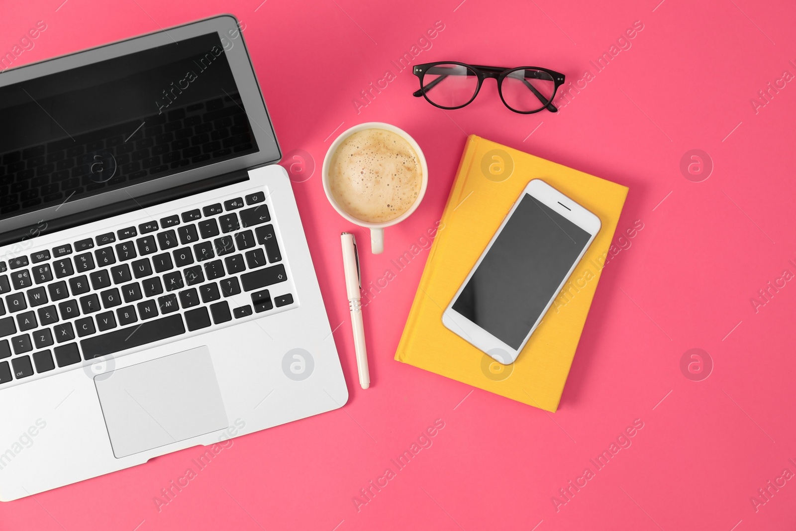 Photo of Flat lay composition with modern devices and office tools on pink background