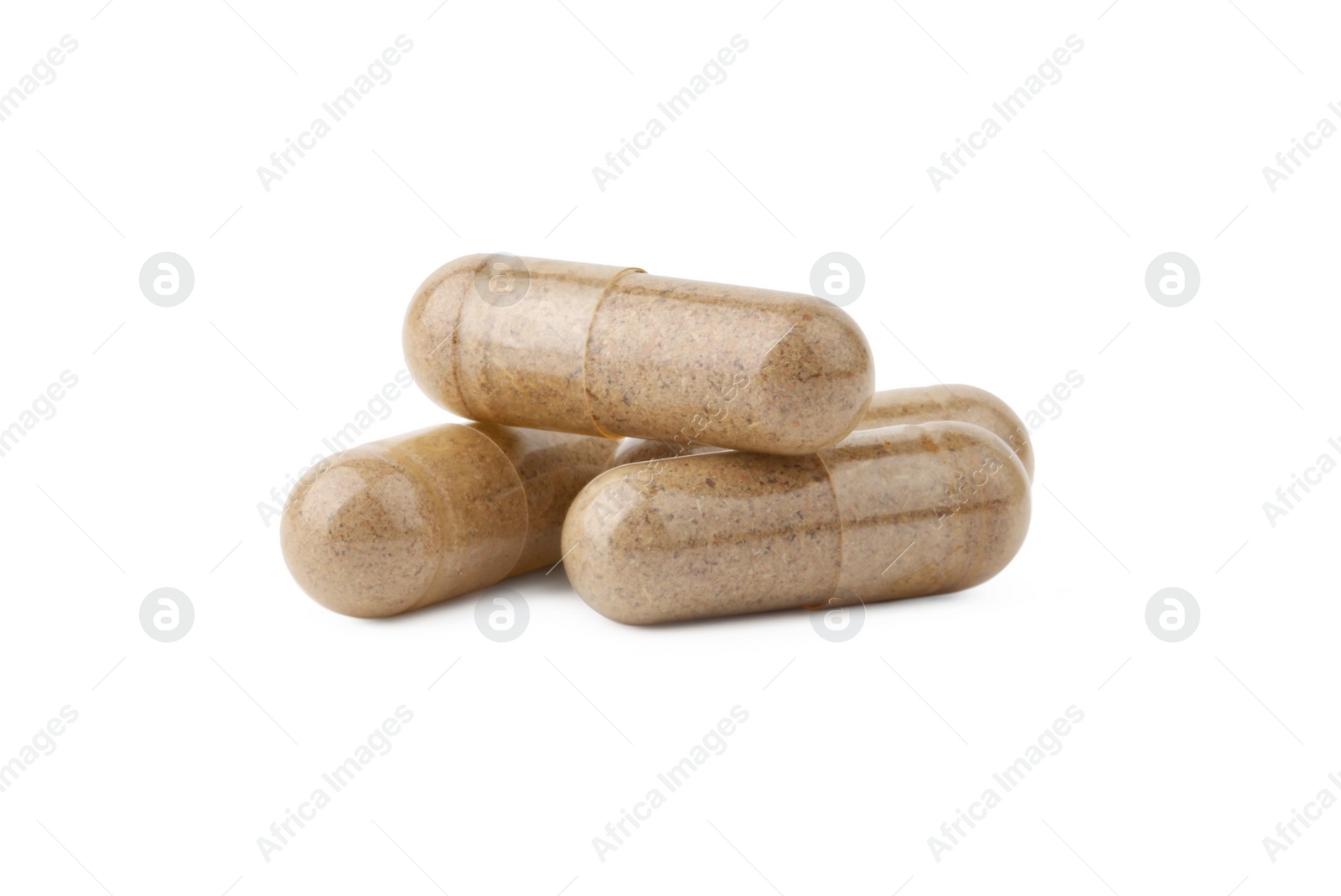 Photo of Pile of vitamin capsules isolated on white