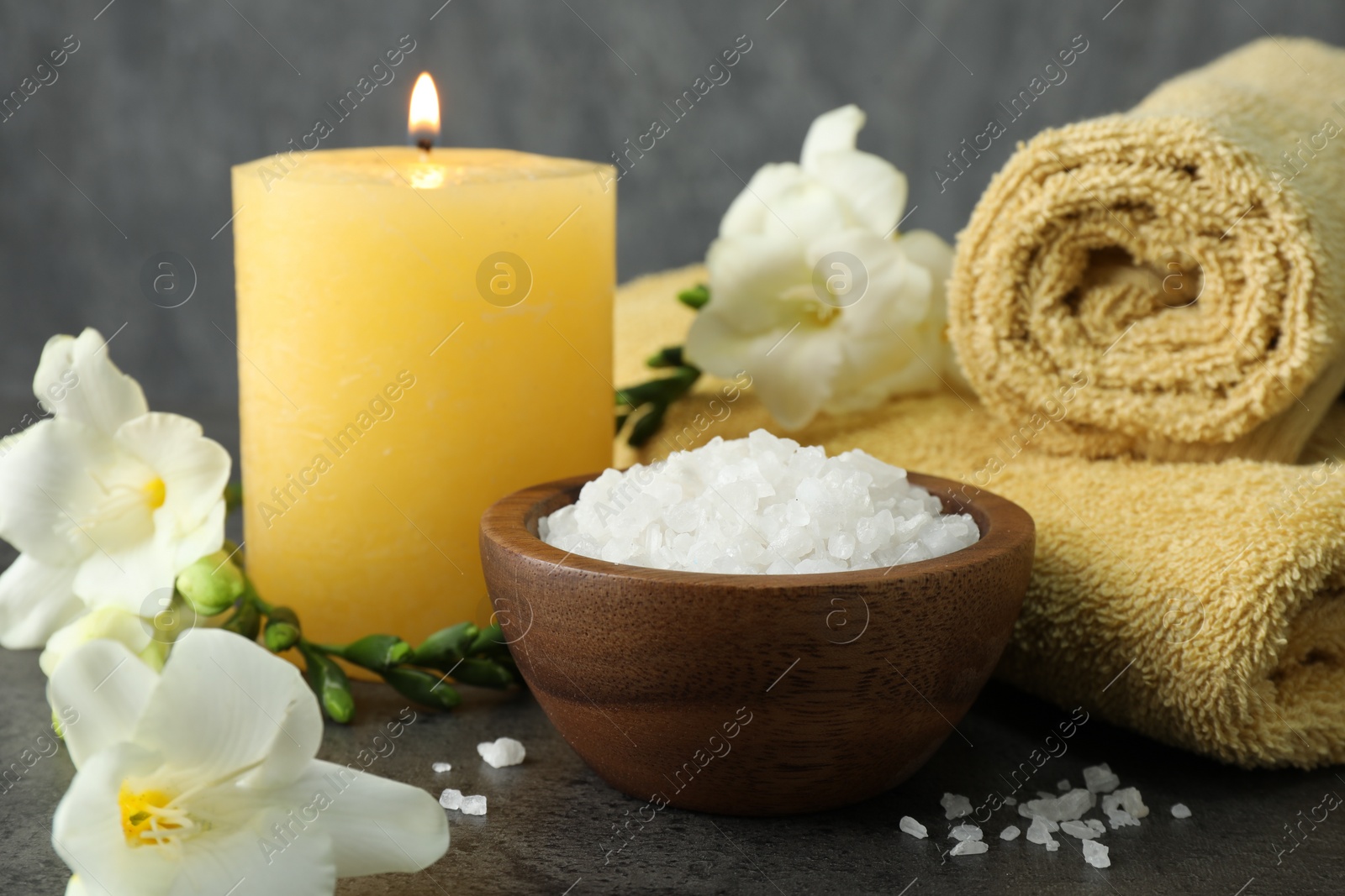 Photo of Composition with different spa products and burning candle, closeup