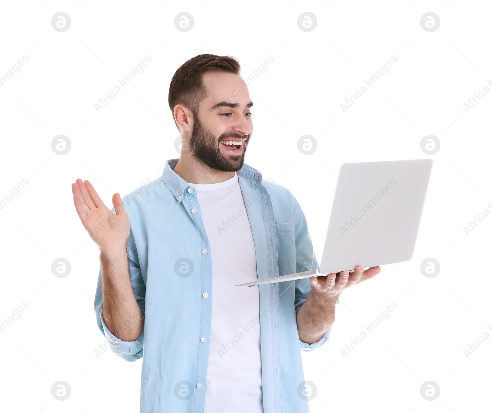 Photo of Man using laptop for video chat isolated on white