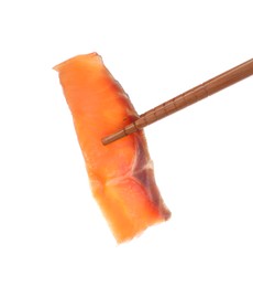 Photo of Chopstick with tasty sashimi (piece of fresh raw salmon) isolated on white