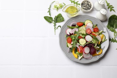 Photo of Balanced diet and vegetarian foods. Plate with different delicious products on white tiled table, flat lay