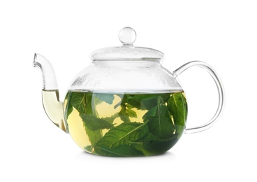 Photo of Teapot with hot aromatic mint tea isolated on white