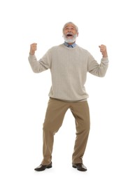 Emotional senior sports fan celebrating isolated on white