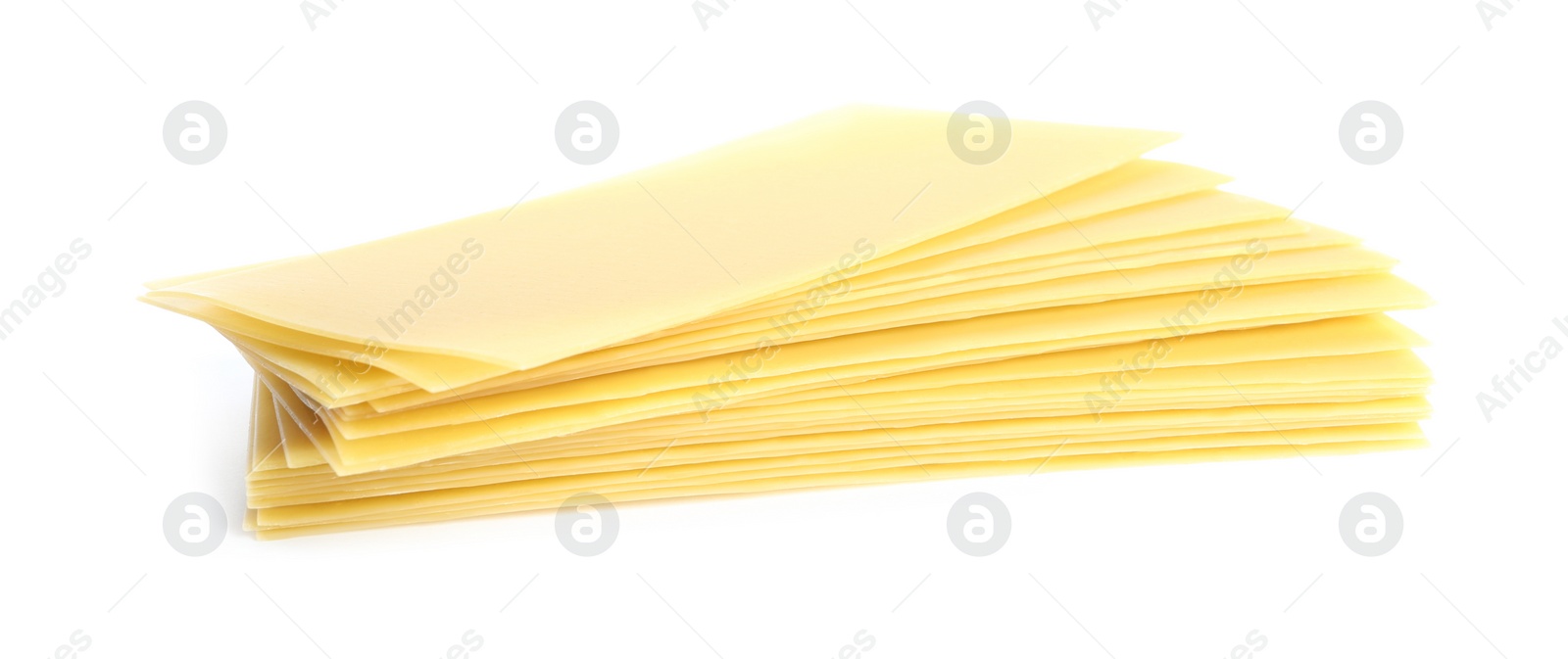 Photo of Stack of uncooked lasagna sheets isolated on white