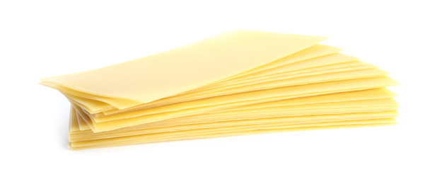 Photo of Stack of uncooked lasagna sheets isolated on white