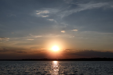 Photo of Picturesque view of beautiful sunrise on riverside. Morning sky