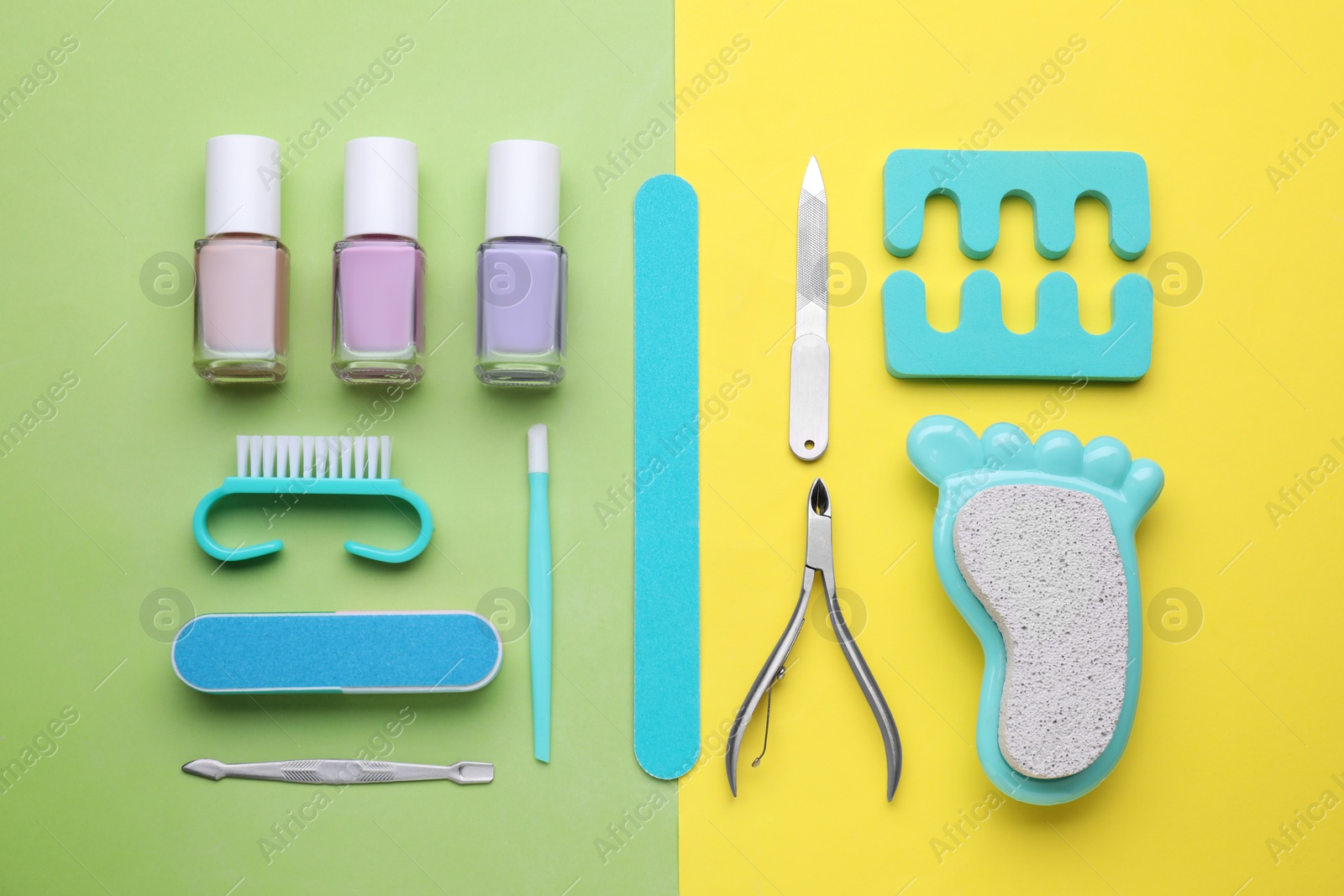 Photo of Set of pedicure tools on color background, flat lay