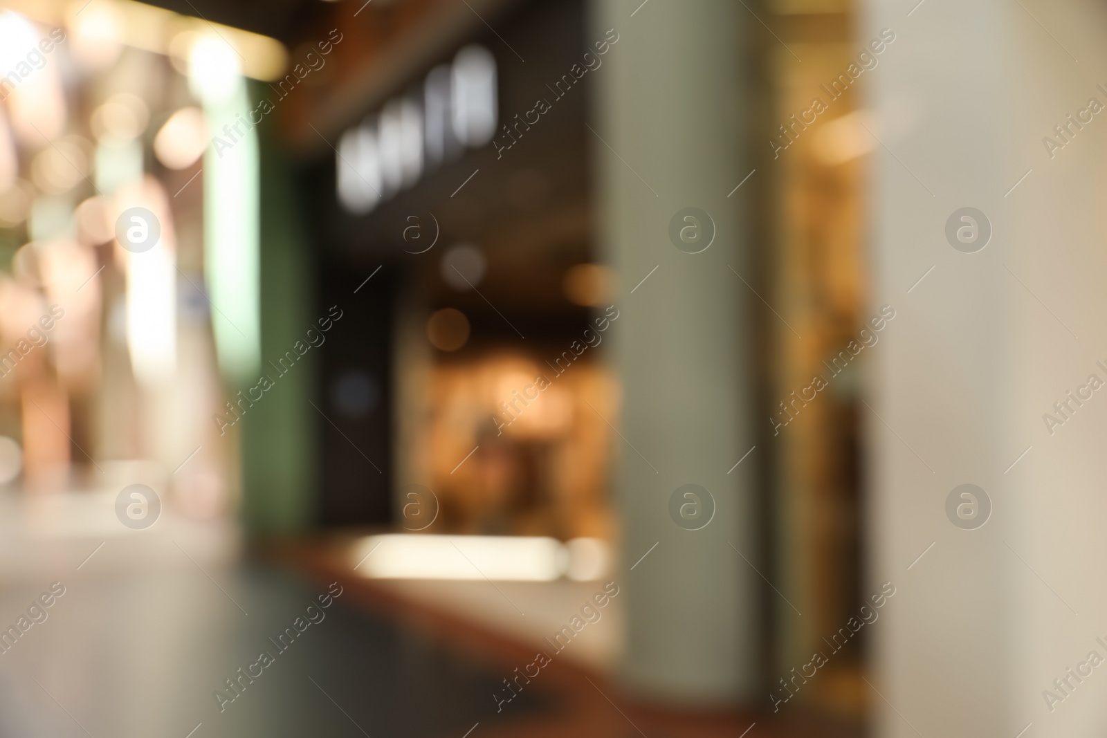 Photo of Blurred view of shopping mall interior. Bokeh effect