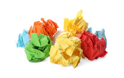 Photo of Crumpled sheets of color paper on white background