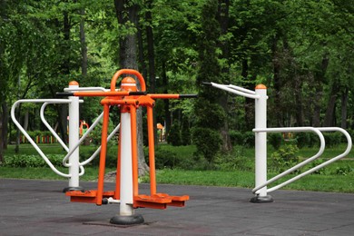 Photo of Empty outdoor gym with double abductor and push up bars