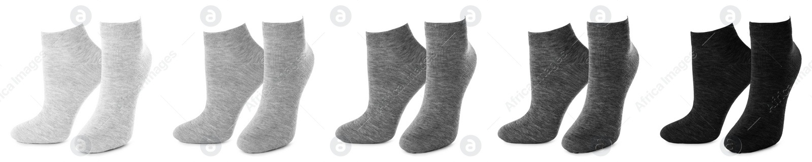 Image of Set with different socks on white background. Banner design