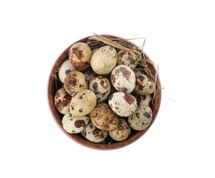 Wooden bowl with quail eggs and straw isolated on white, top view