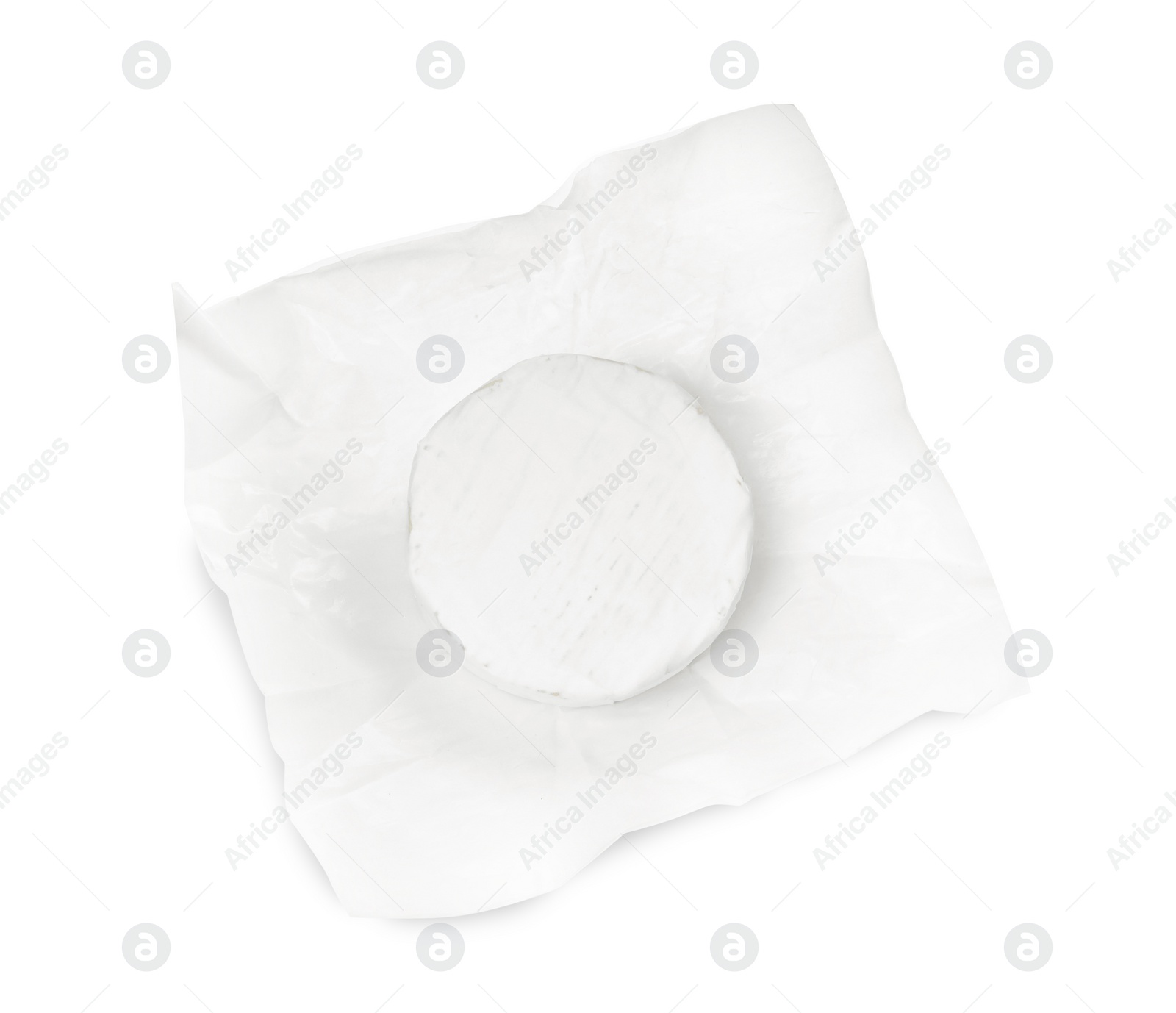 Photo of Tasty brie cheese with wrapper isolated on white, top view