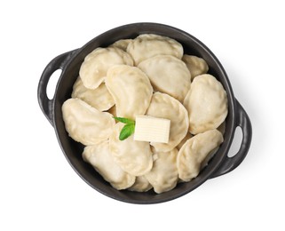 Serving pan with delicious dumplings (varenyky) isolated on white, top view