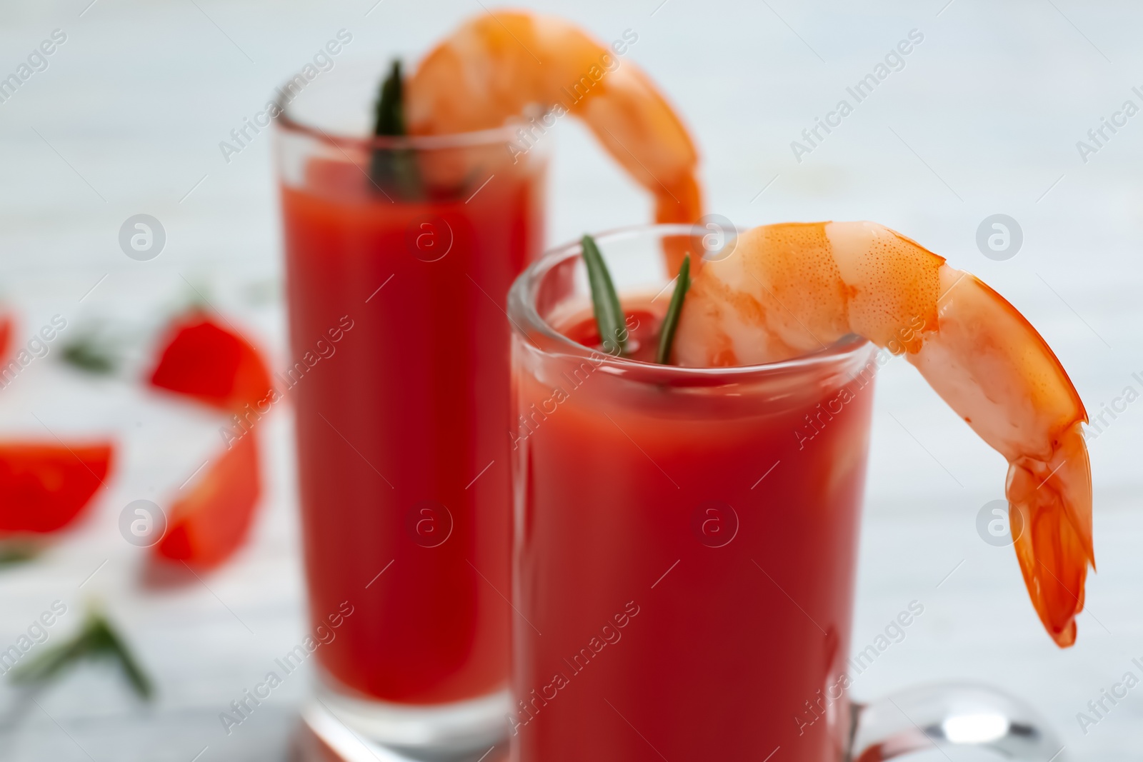 Photo of Delicious shrimp cocktail with tomato sauce, closeup