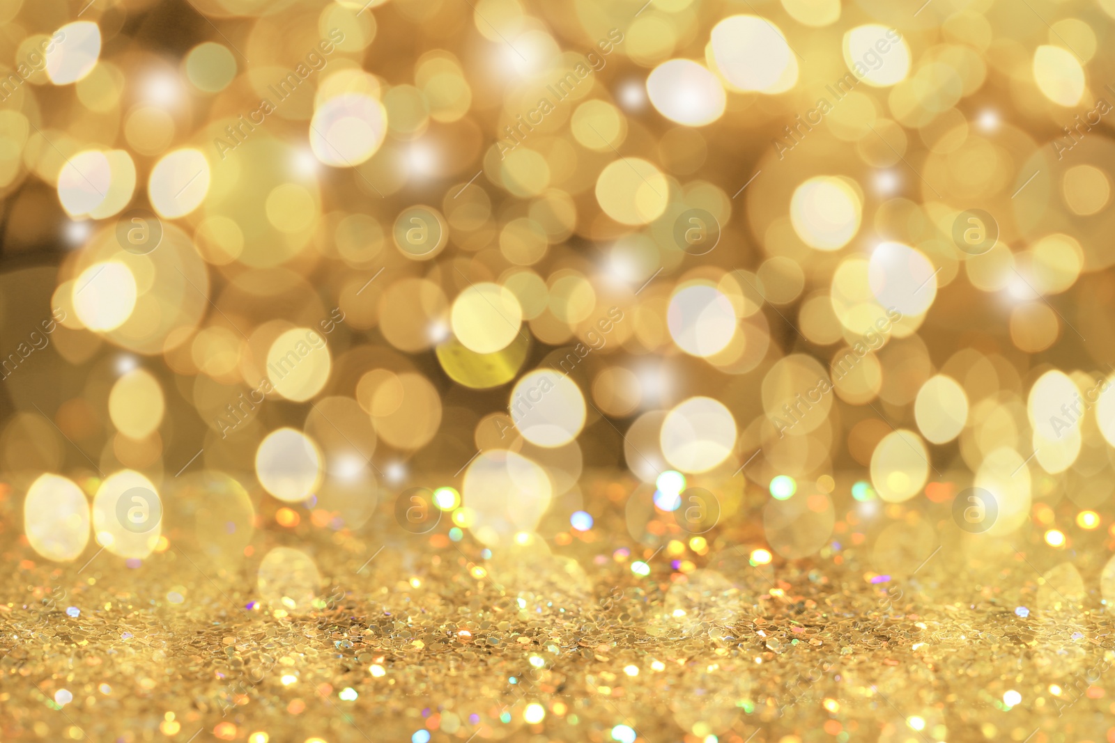 Image of Gold glitter with bokeh effect as abstract background