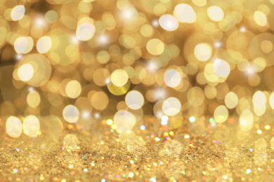 Image of Gold glitter with bokeh effect as abstract background