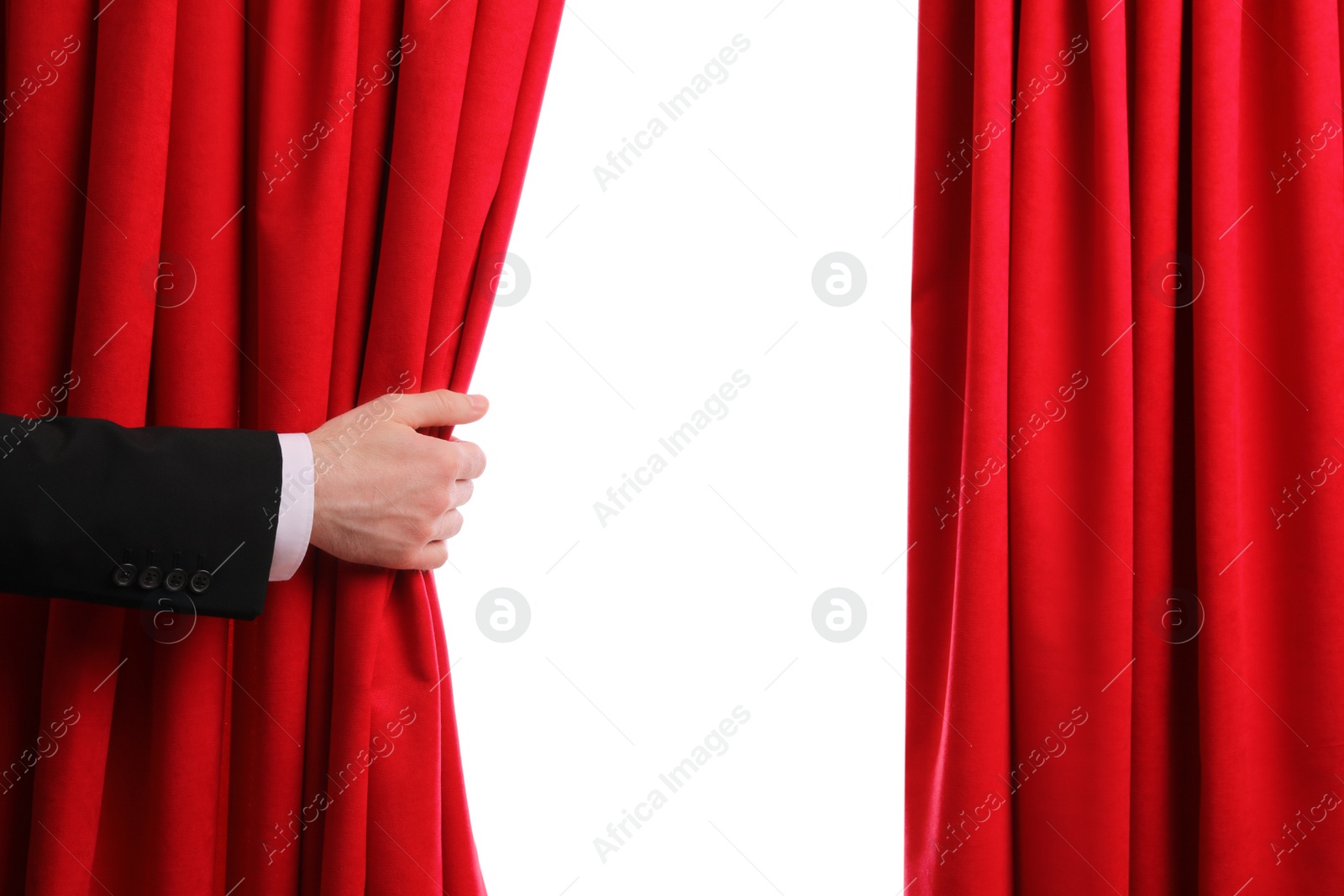 Photo of Man opening red front curtains on white background, closeup