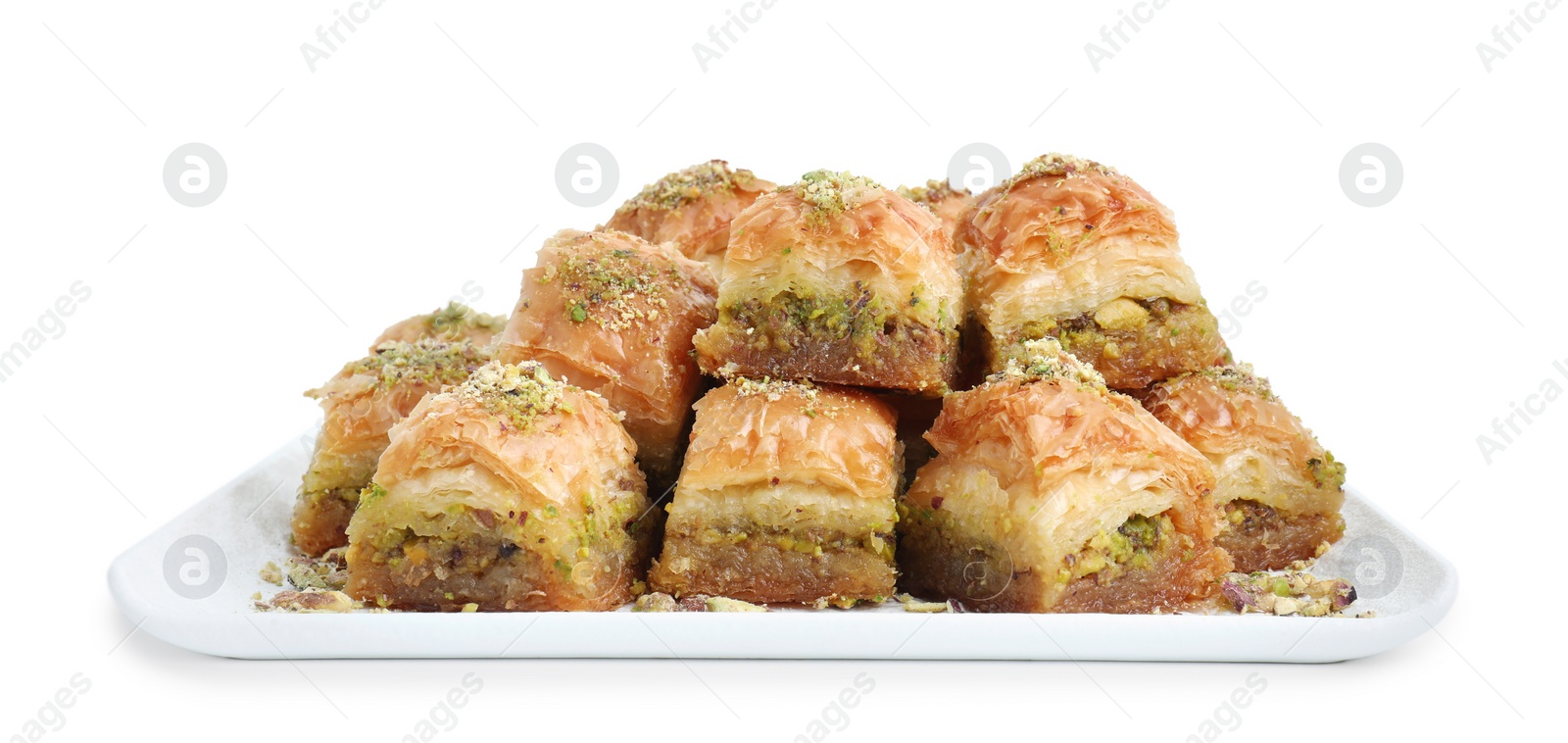 Photo of Delicious fresh baklava with chopped nuts isolated on white. Eastern sweets