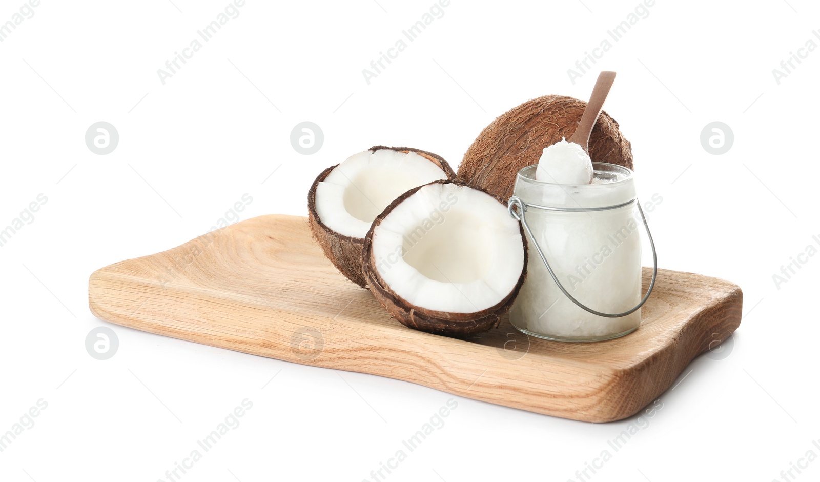 Photo of Composition with organic coconut oil on white background. Healthy cooking