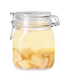 Photo of Delicious quince drink in glass jar isolated on white